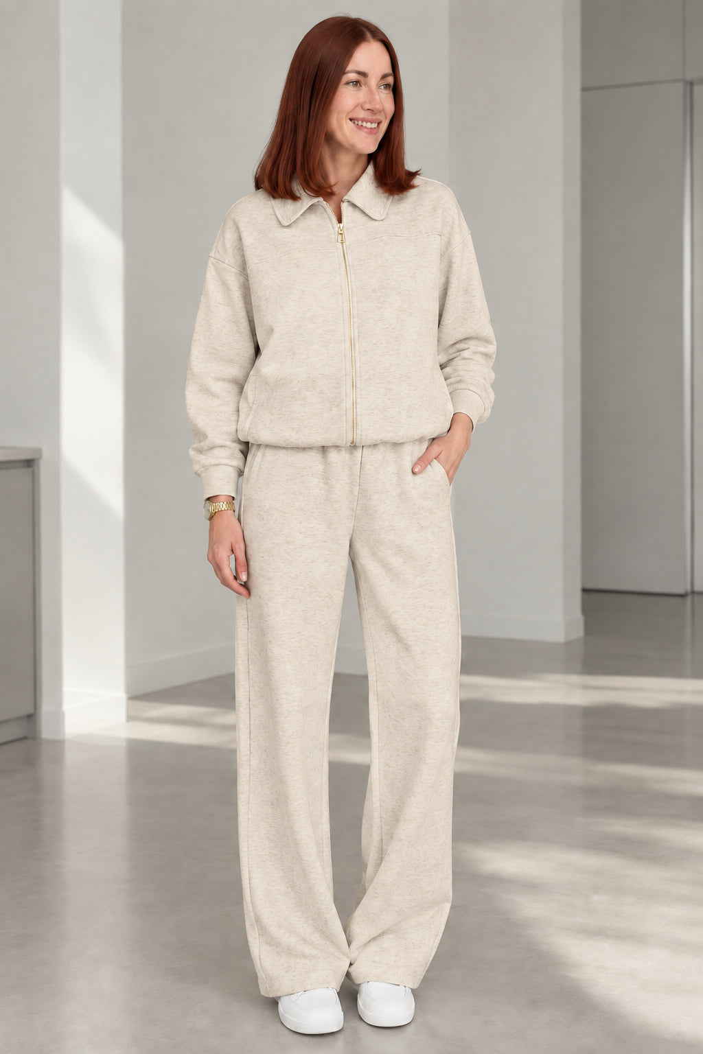 Woman wearing Oatmeal beige collared zip jacket and matching wide-leg pants