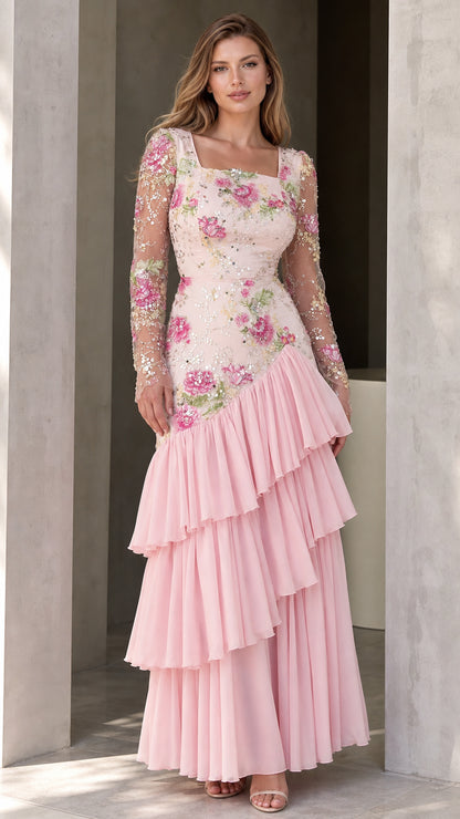 Front view of woman wearing pink square-neck floral embroidered sequin maxi dress with tiered ruffle skirt