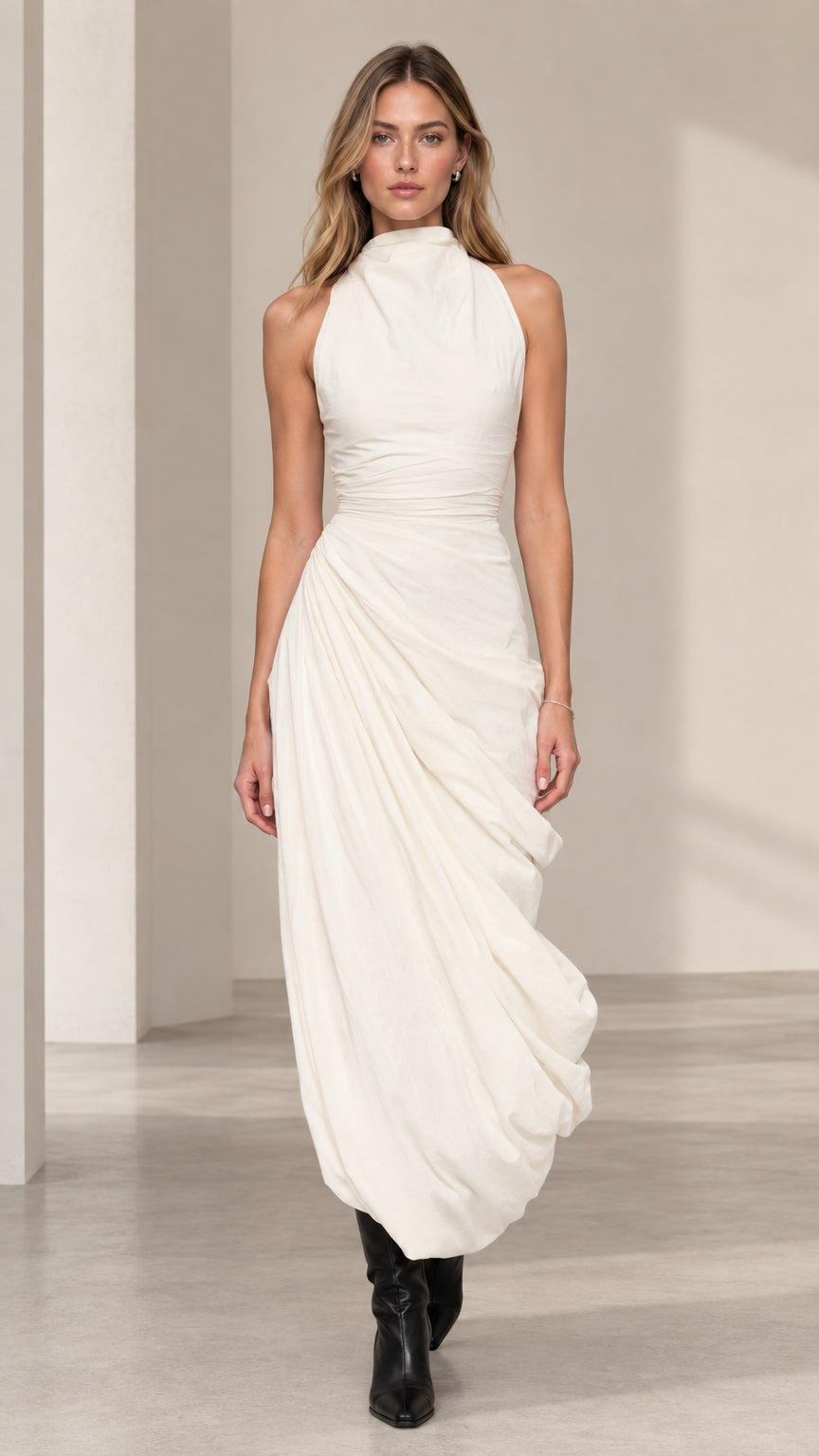 Front view of model wearing ivory sleeveless high neck ruched draped maxi dress