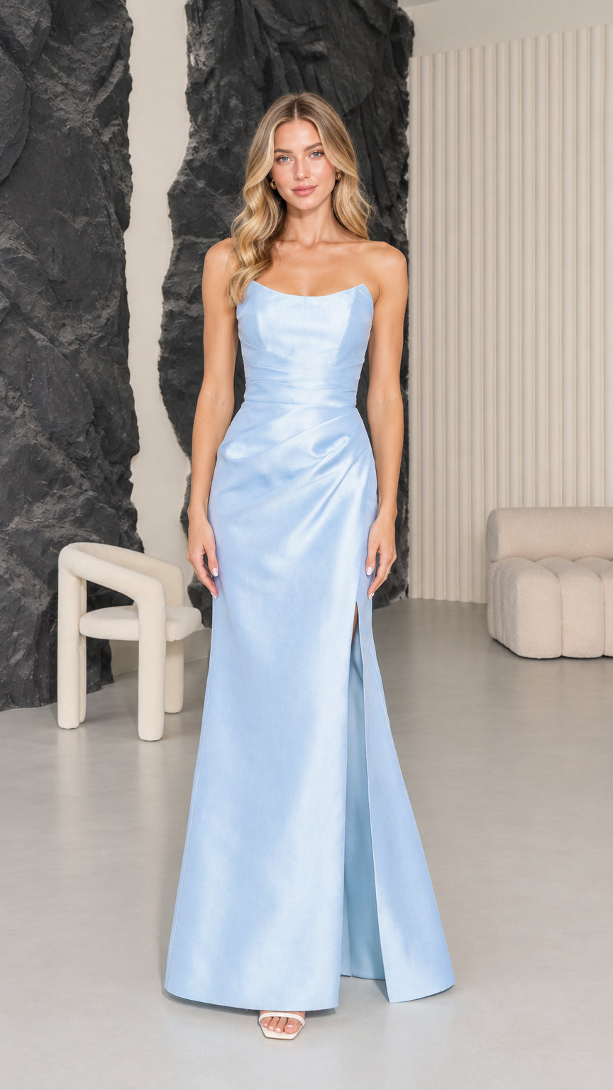 Front full view of woman wearing Light Blue strapless corset satin maxi gown with side slit