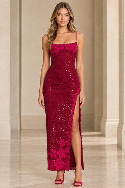 Front view of woman wearing berry red floral sequin maxi dress with high side slit
