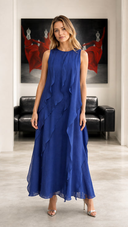 Front view of woman wearing royal blue sleeveless ruffled chiffon maxi dress