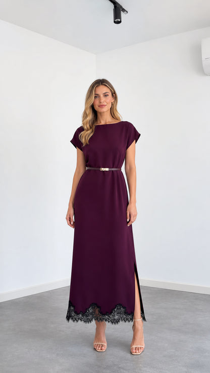 Front view of woman wearing burgundy cap sleeve belted maxi dress with black lace trim