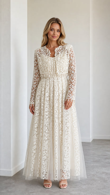 Front view of model wearing ivory floral lace maxi dress with cropped jacket