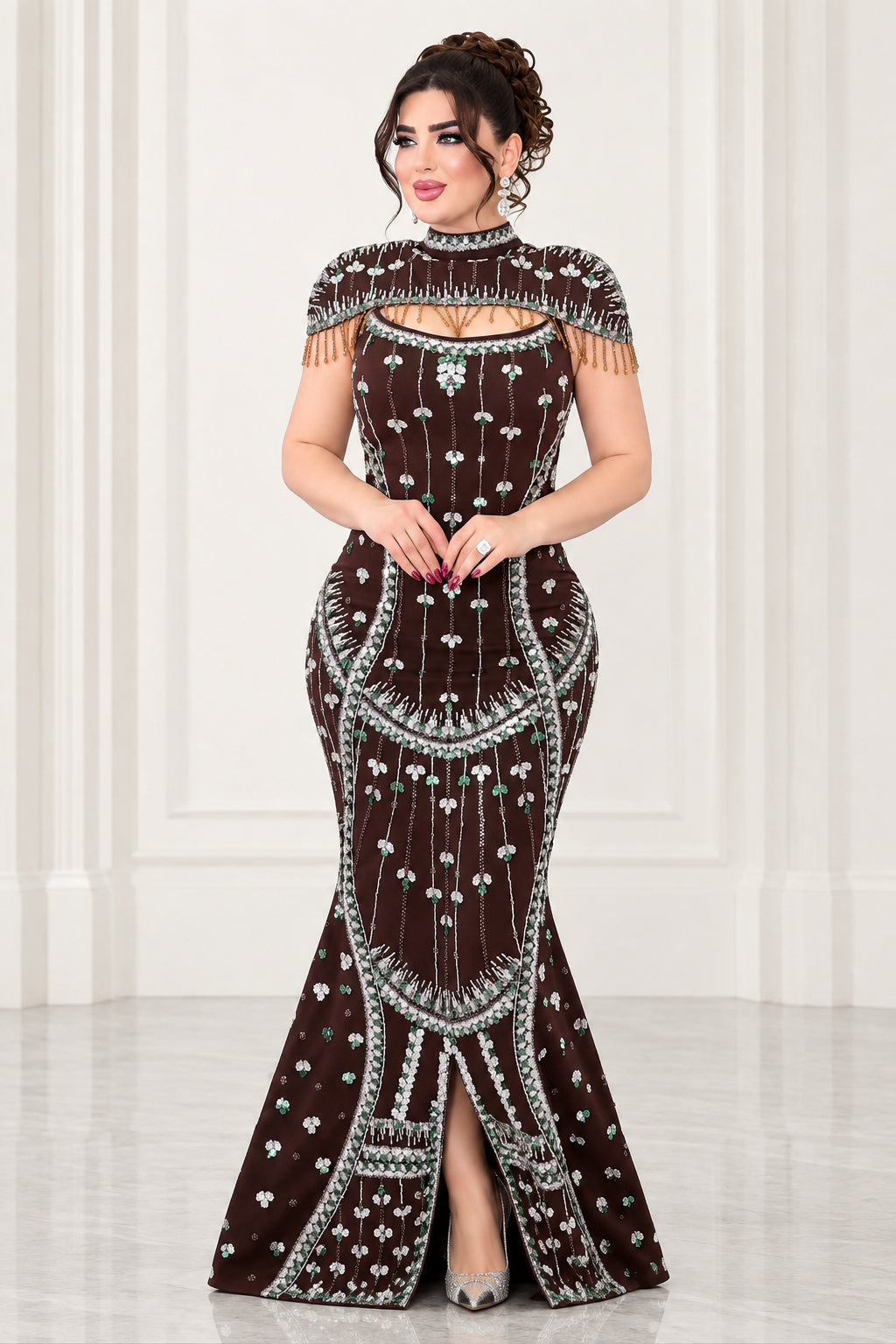 Front view of model wearing full-length chocolate brown rhinestone embellished mermaid evening gown with beaded fringe