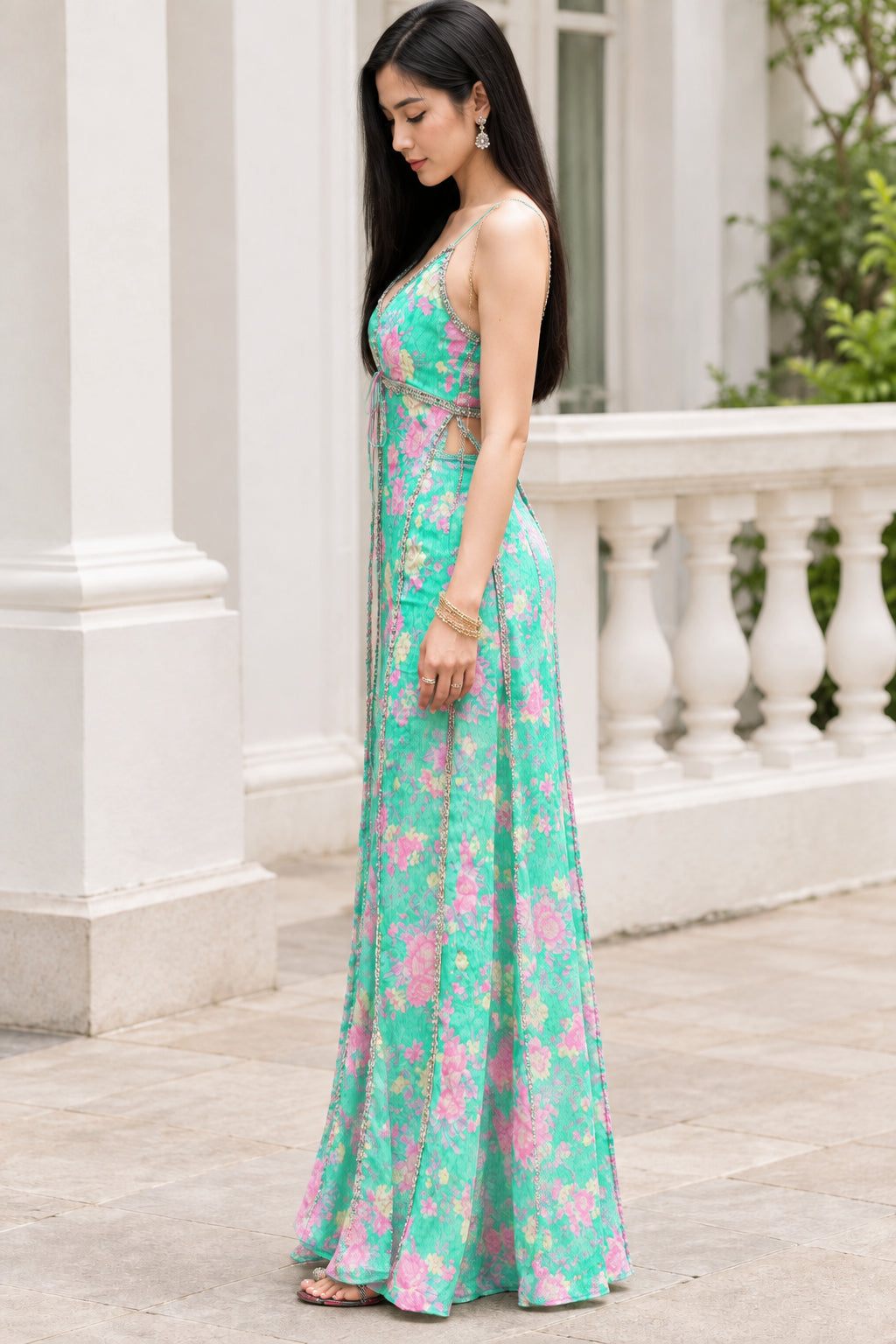 Side view of model wearing Mint Green floral slit maxi dress