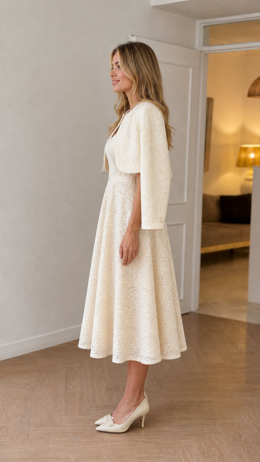 Side profile of Ivory lace midi dress set on model