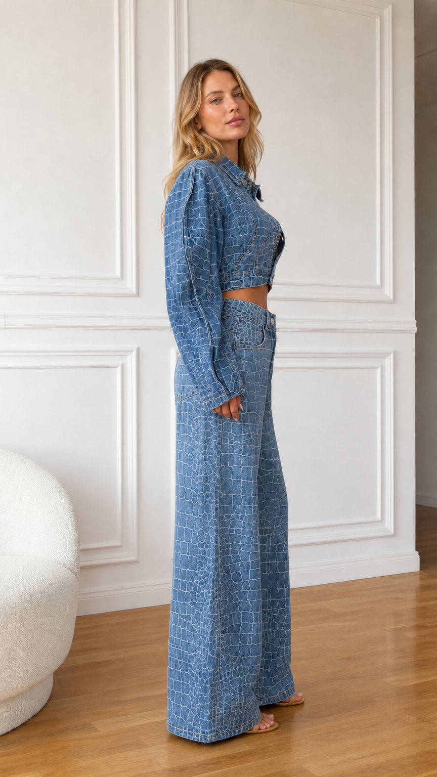 Side profile view of model wearing blue croc textured denim matching set