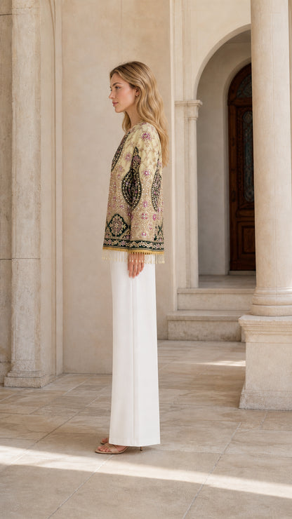 Side profile of model wearing Champagne Gold ornate embroidered open front jacket