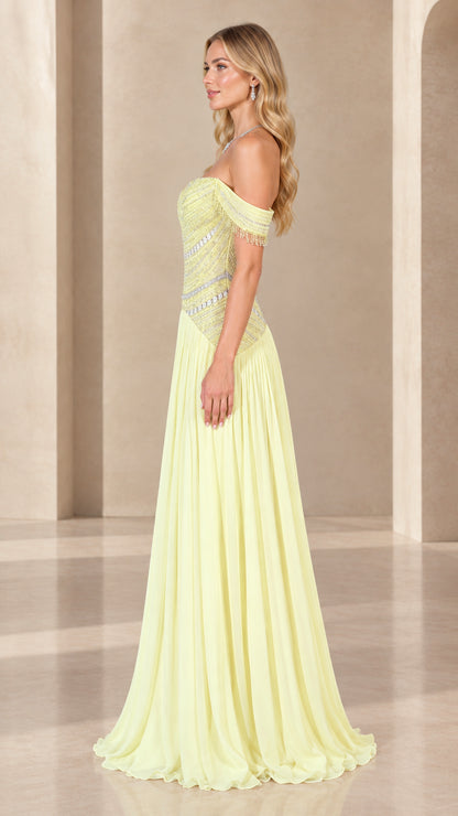 Side profile view of pastel yellow formal maxi dress showing beaded bodice and pleated skirt
