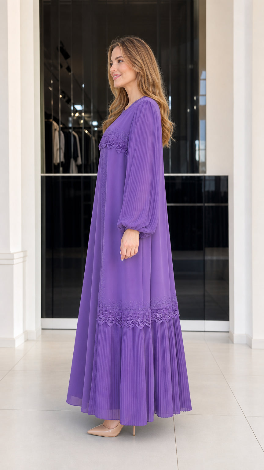 Side profile view of woman wearing purple pleated evening maxi gown