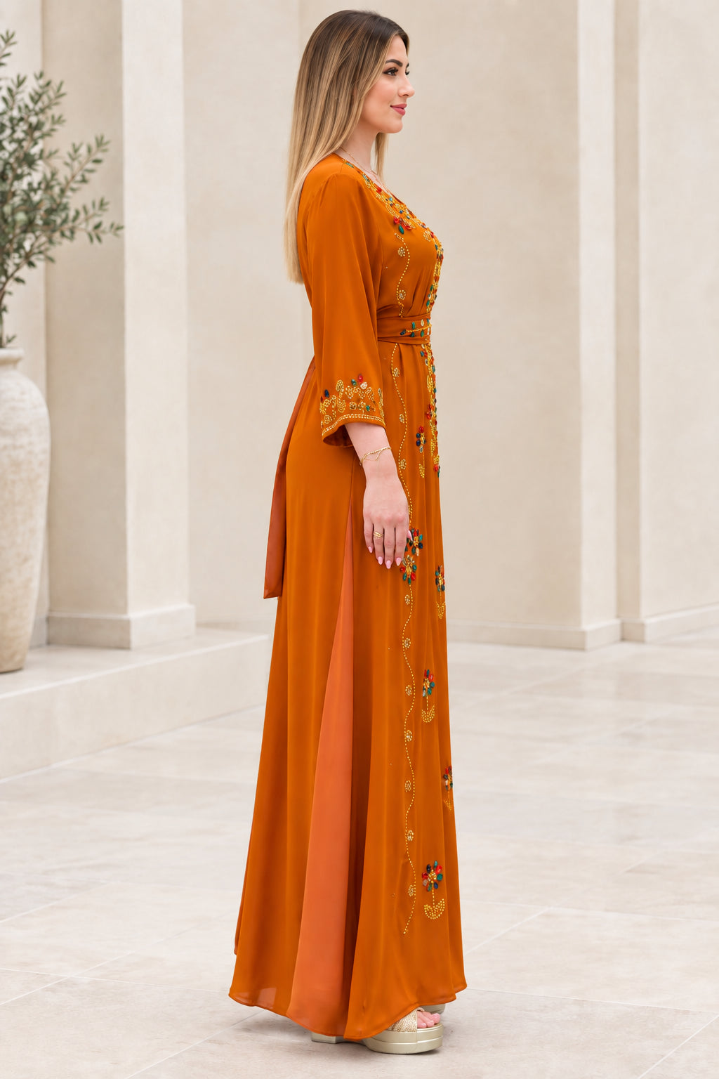 Side view of rust orange modest embellished kaftan maxi dress