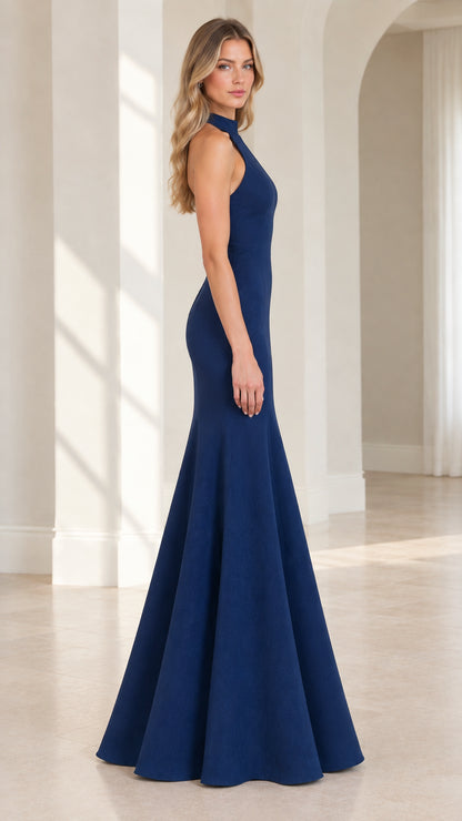 Side profile of model in Navy Blue backless mermaid maxi dress
