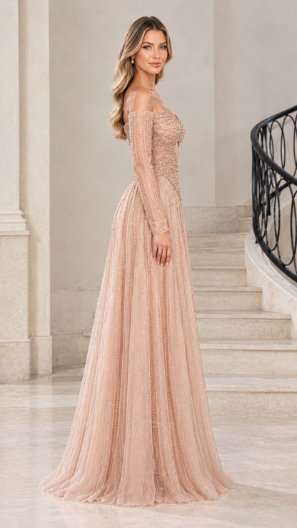 Side profile view of Champagne beaded A-line formal gown with long sleeves