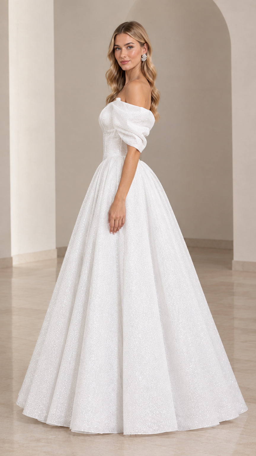 Side profile of white shimmering ball gown with puff sleeves