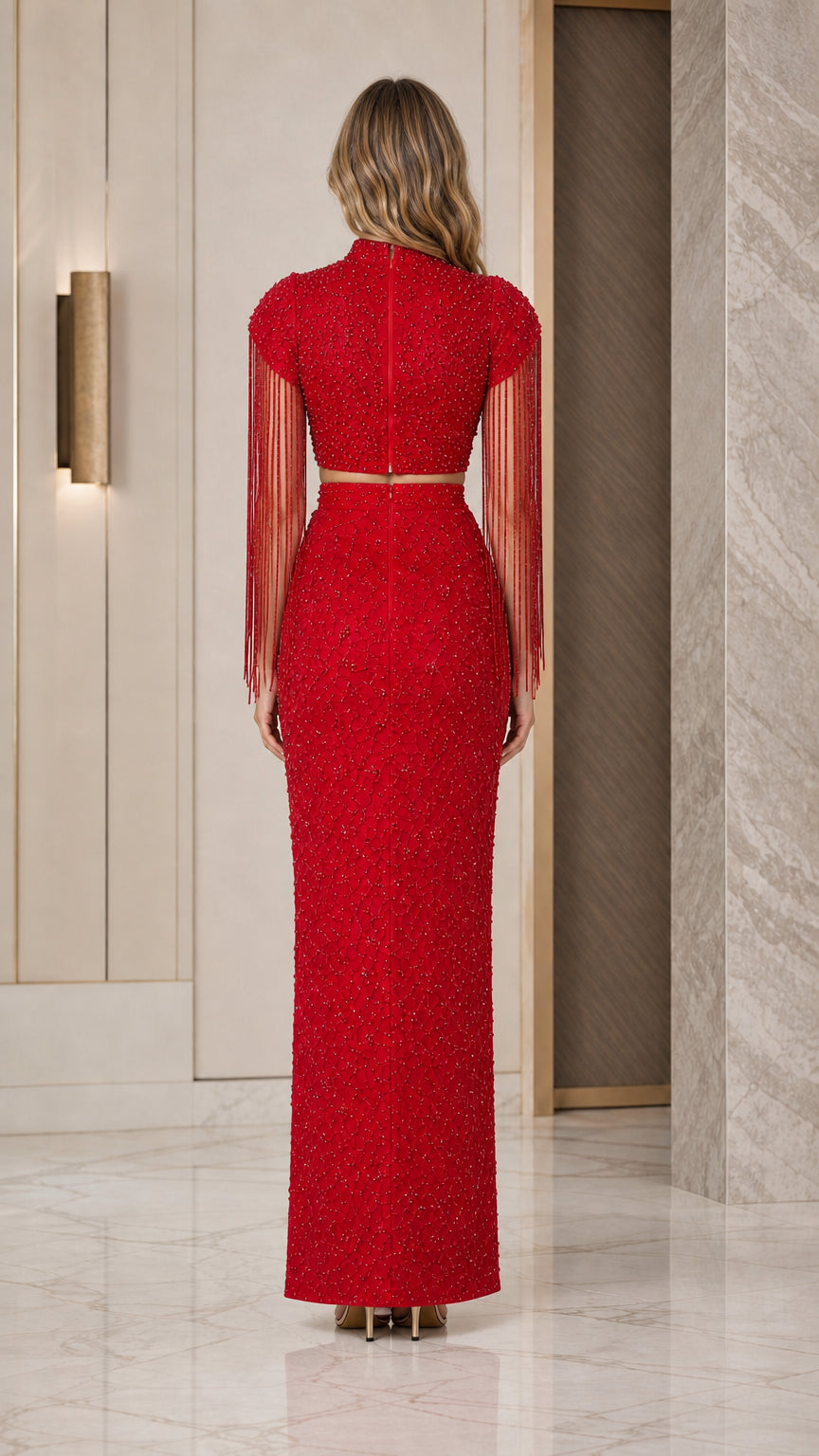 Back view of model showcasing the Red Beaded Two-Piece Maxi Skirt and Top Set