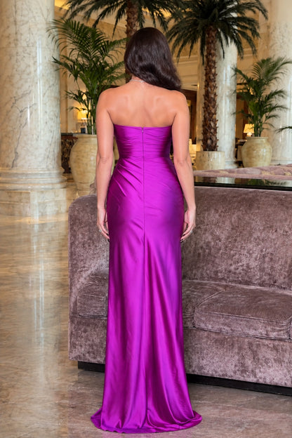 Back view of model wearing a magenta floor-length strapless evening dress