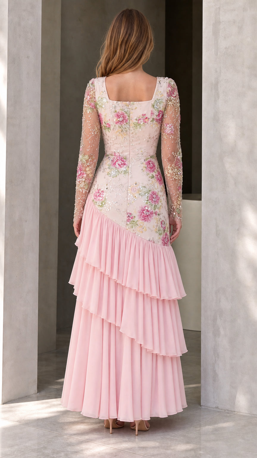 Back view of pink embroidered square-neck evening gown showing zipper and cascading skirt tiers