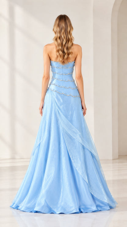 Back view of strapless light blue evening gown with floor-length flared skirt