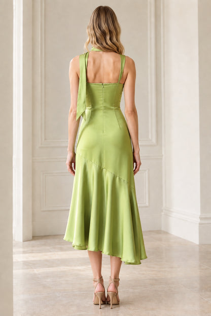 Back full-length view of pistachio green satin midi dress with back zipper detail