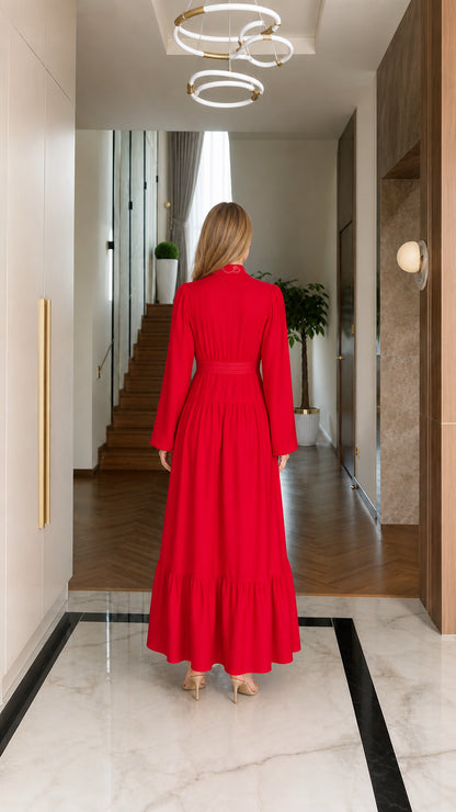 Back view of red long sleeve pleated waist maxi dress