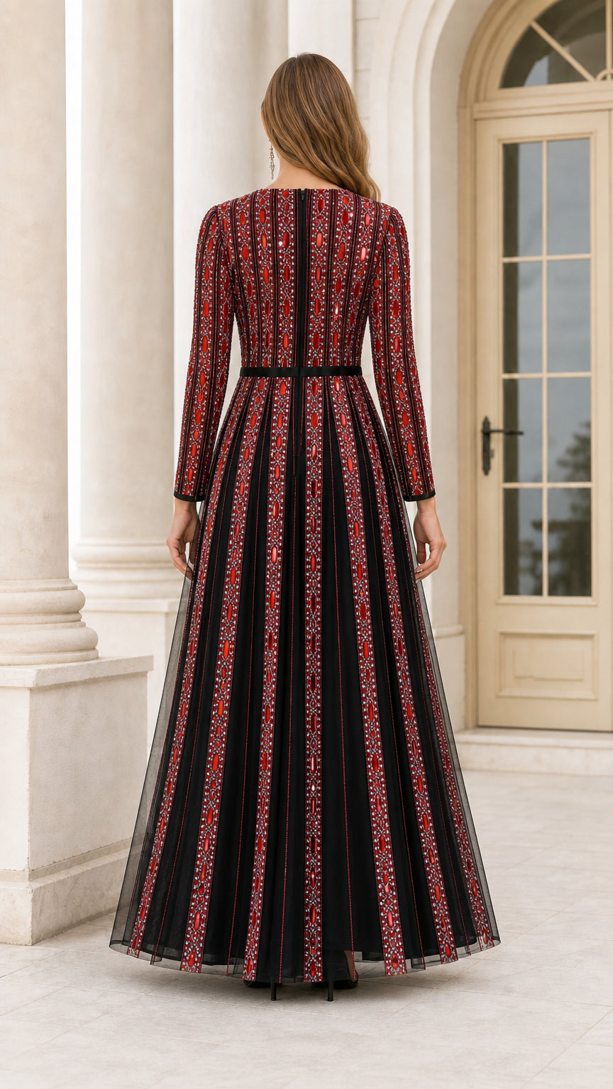 Back view of Black and Red embellished long sleeve A-line formal gown