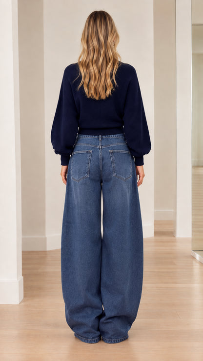 Back view of model wearing Navy Blue long sleeve knit sweater