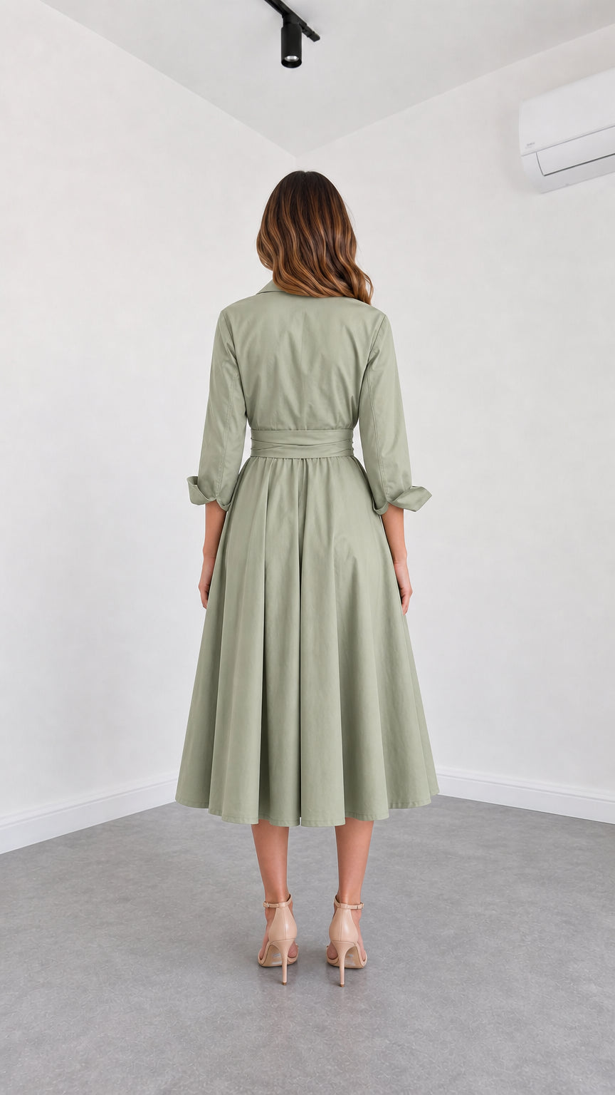 Back view of model wearing Sage Green midi shirt dress