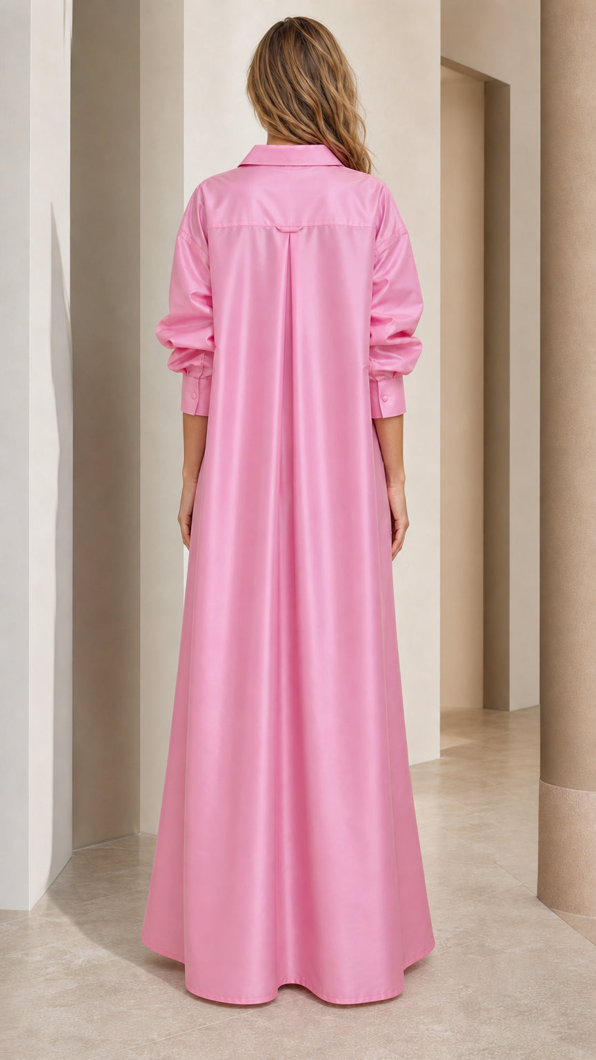 Back full view of woman wearing pink sequin embroidered maxi shirt dress