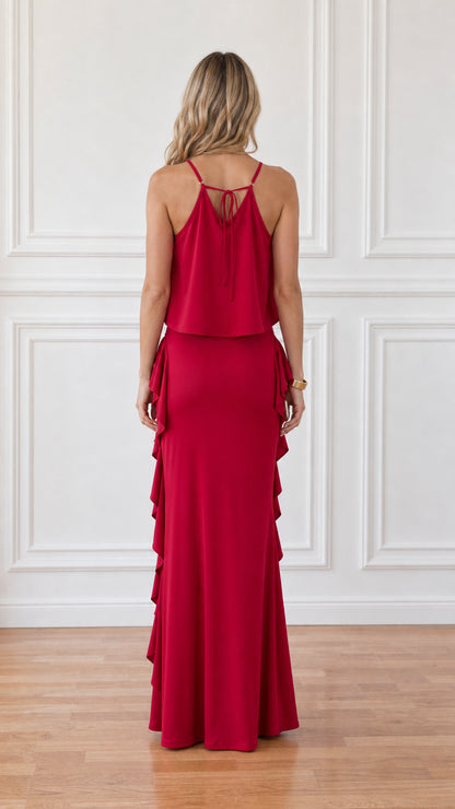 Back view of red sleeveless crop top and floor length maxi skirt set
