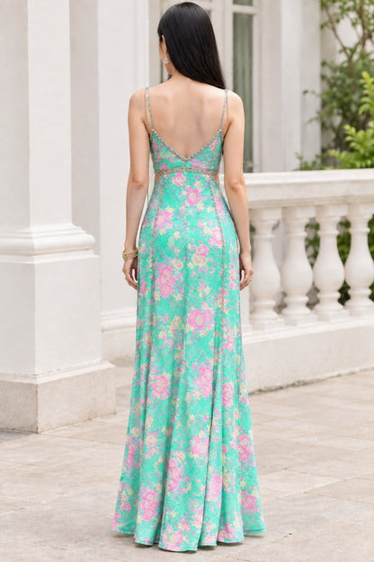 Back view of model showing low back design of floral maxi dress