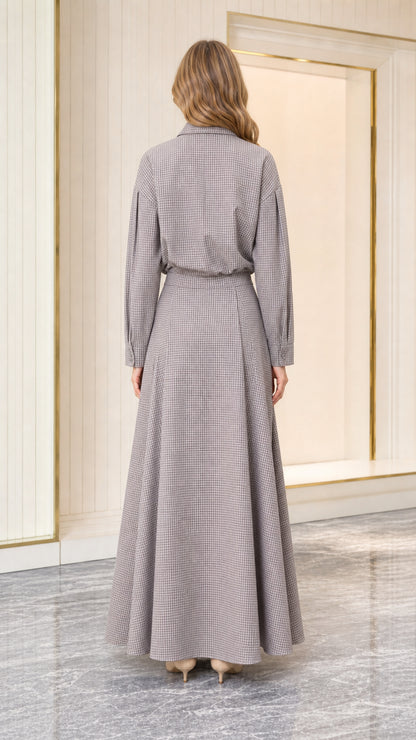 Back view of model in grey houndstooth long sleeve maxi dress