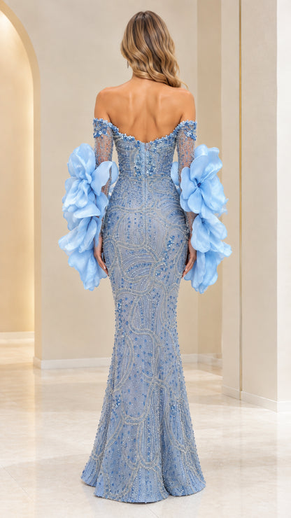 Back view of model in Light Blue floor-length beaded formal gown