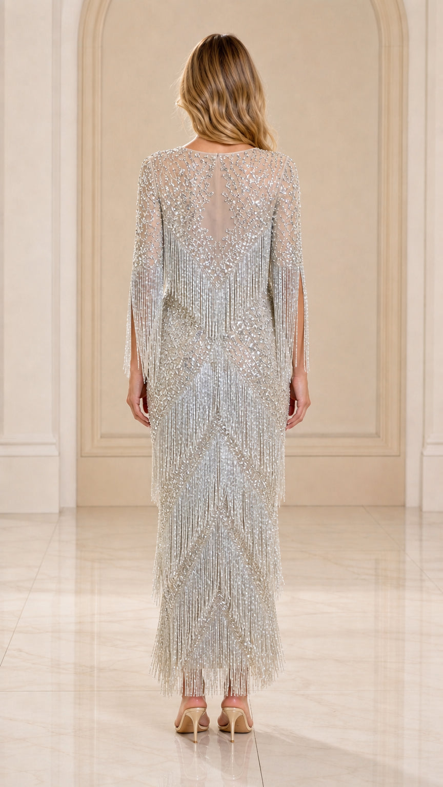 Back view of silver sequin fringe column maxi dress