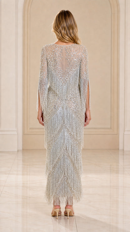 Back view of silver sequin fringe column maxi dress