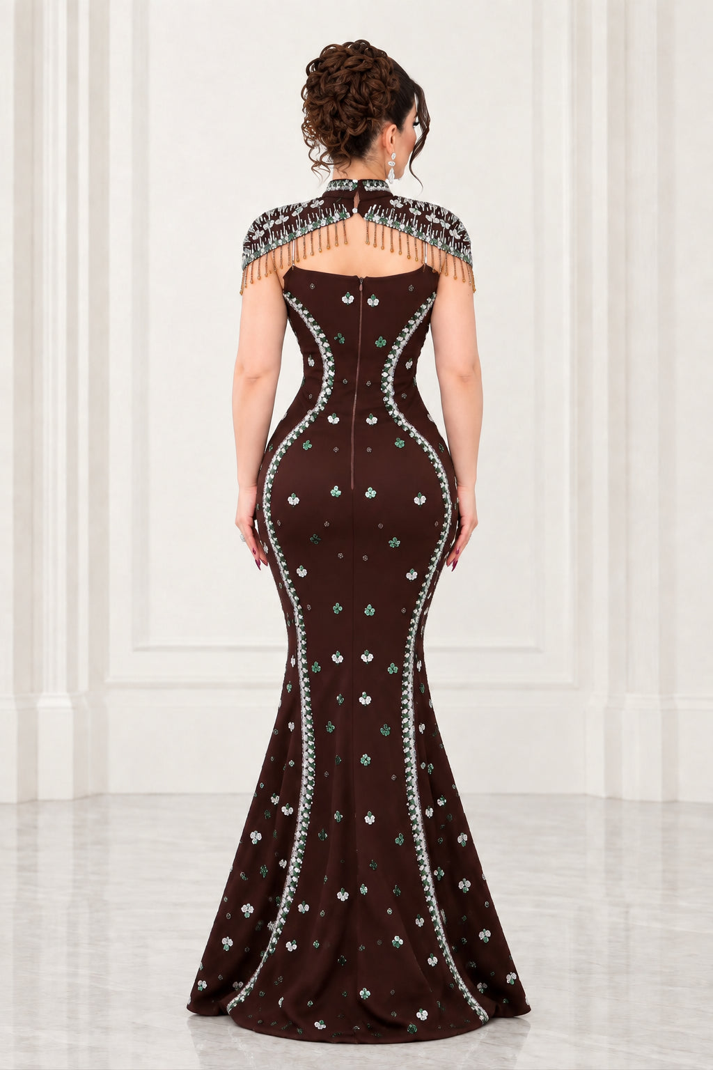 Rear view showing back silhouette and zipper of chocolate brown embellished evening dress