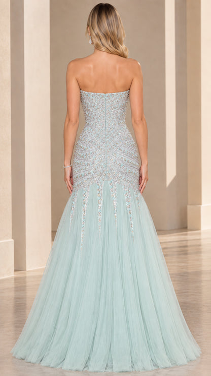 Back view of mint green strapless evening gown showing fitted back and flared tulle skirt