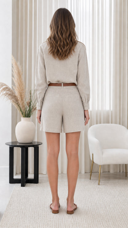 Back view of woman wearing Light Grey collared shirt and tailored shorts set