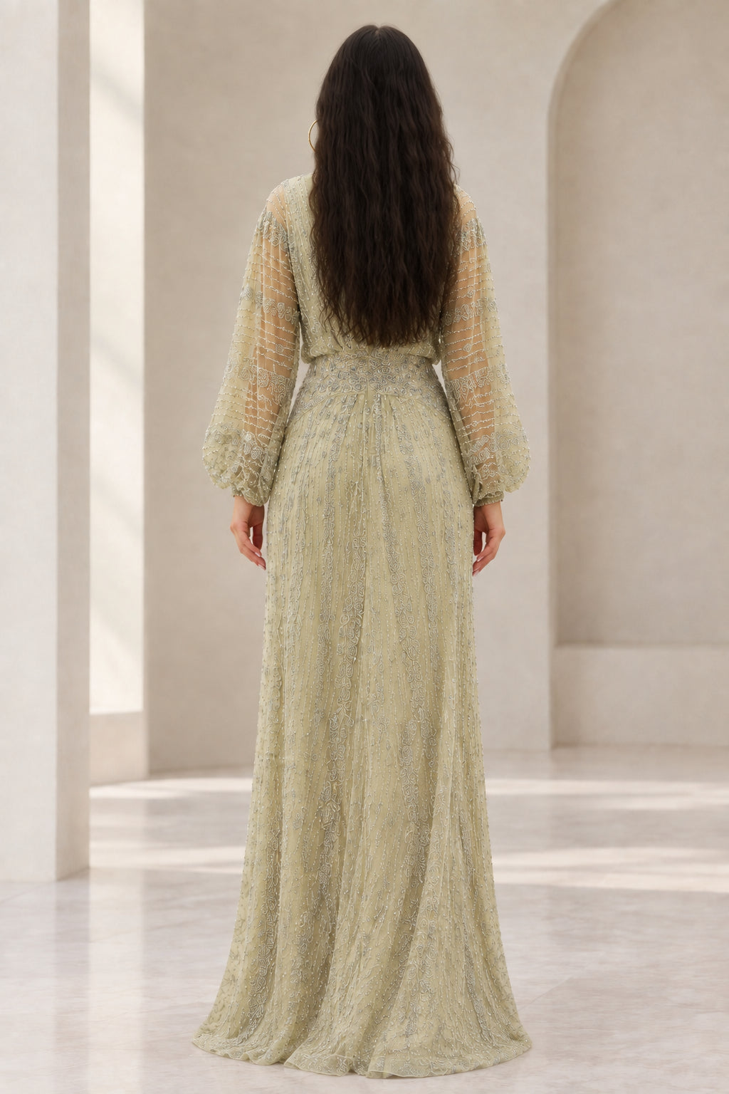Back view of Sage Green beaded evening gown with long sleeves