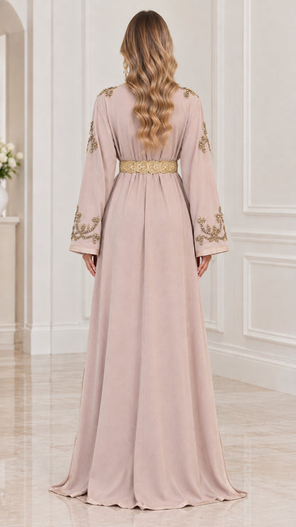 Back view of woman wearing Dusty Pink floor-length embroidered kaftan gown