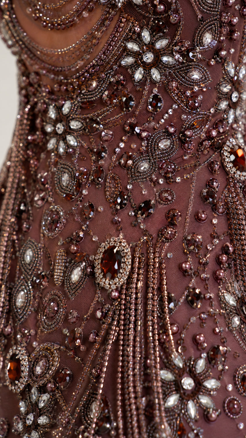 Close-up detail of the intricate beadwork and crystal embellishments