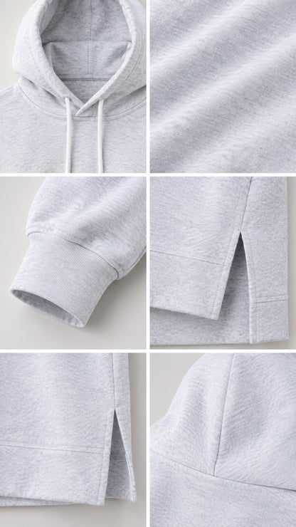Close-up details of heather grey hoodie neckline, drawstrings, ribbed cuffs, and side-slit hem