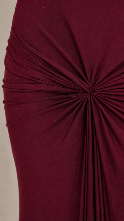 Close-up of fabric texture and cinched knot detail on Burgundy gown