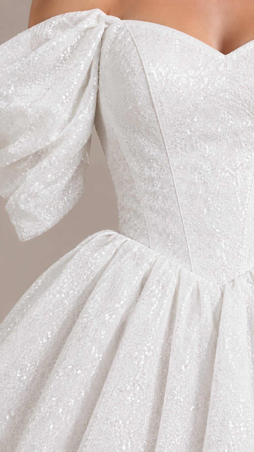 Close-up of sparkling fabric texture and structured sweetheart bodice