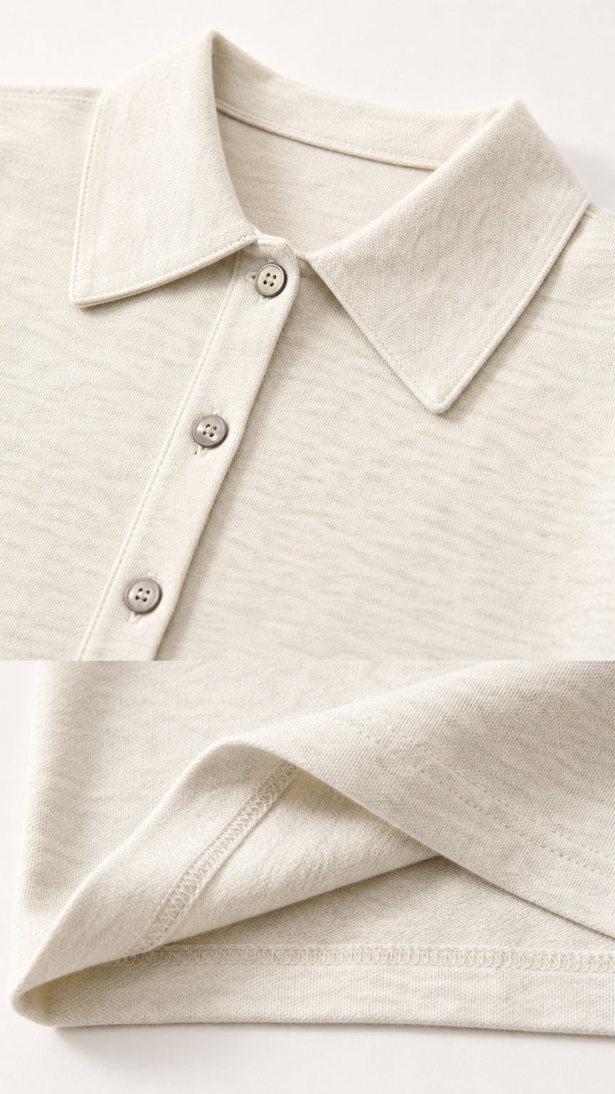 Close-up detail of polo collar buttons and knit fabric texture