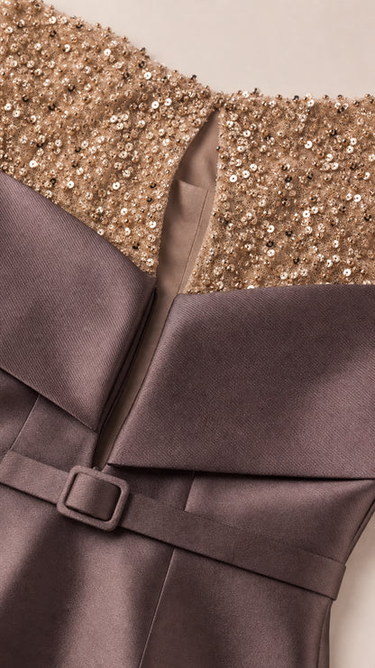 Close-up of sequin yoke and draped collar detail