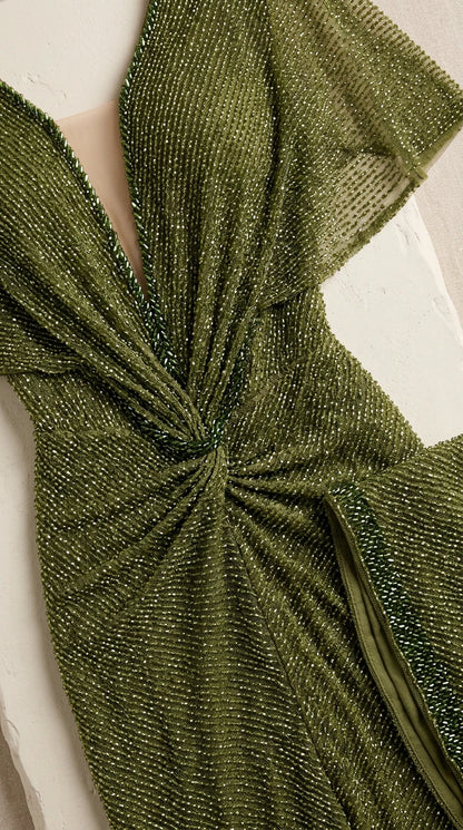 Close-up detail of textured shimmer fabric and center-front twist waist knot