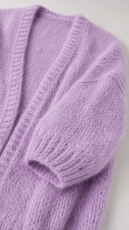 Close-up of lavender knit cardigan texture and sleeve