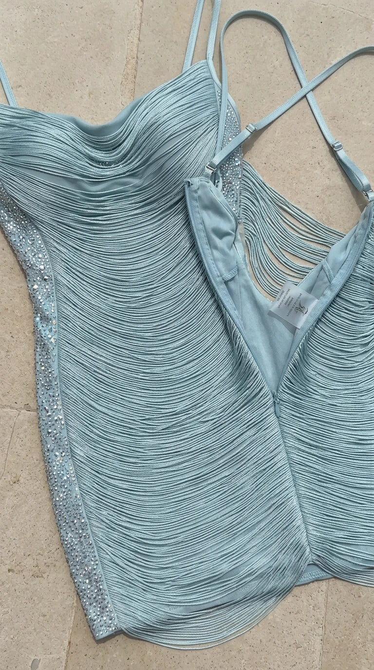 Close-up detail of textured ruching, lining, and shimmer side trim on Light Blue dress