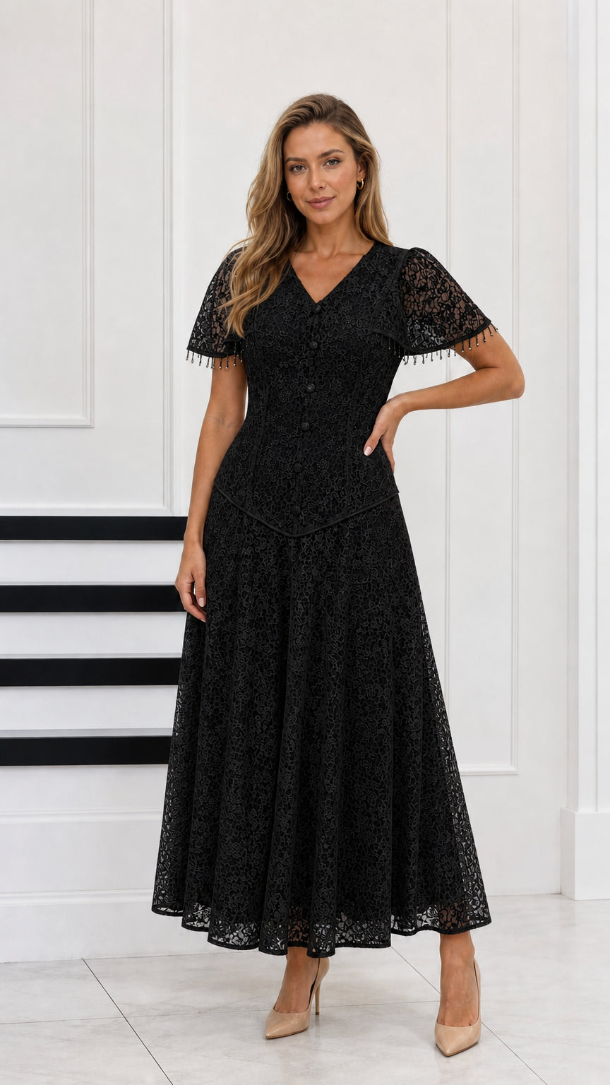 Full-length view of black floral lace maxi dress with capelet sleeves